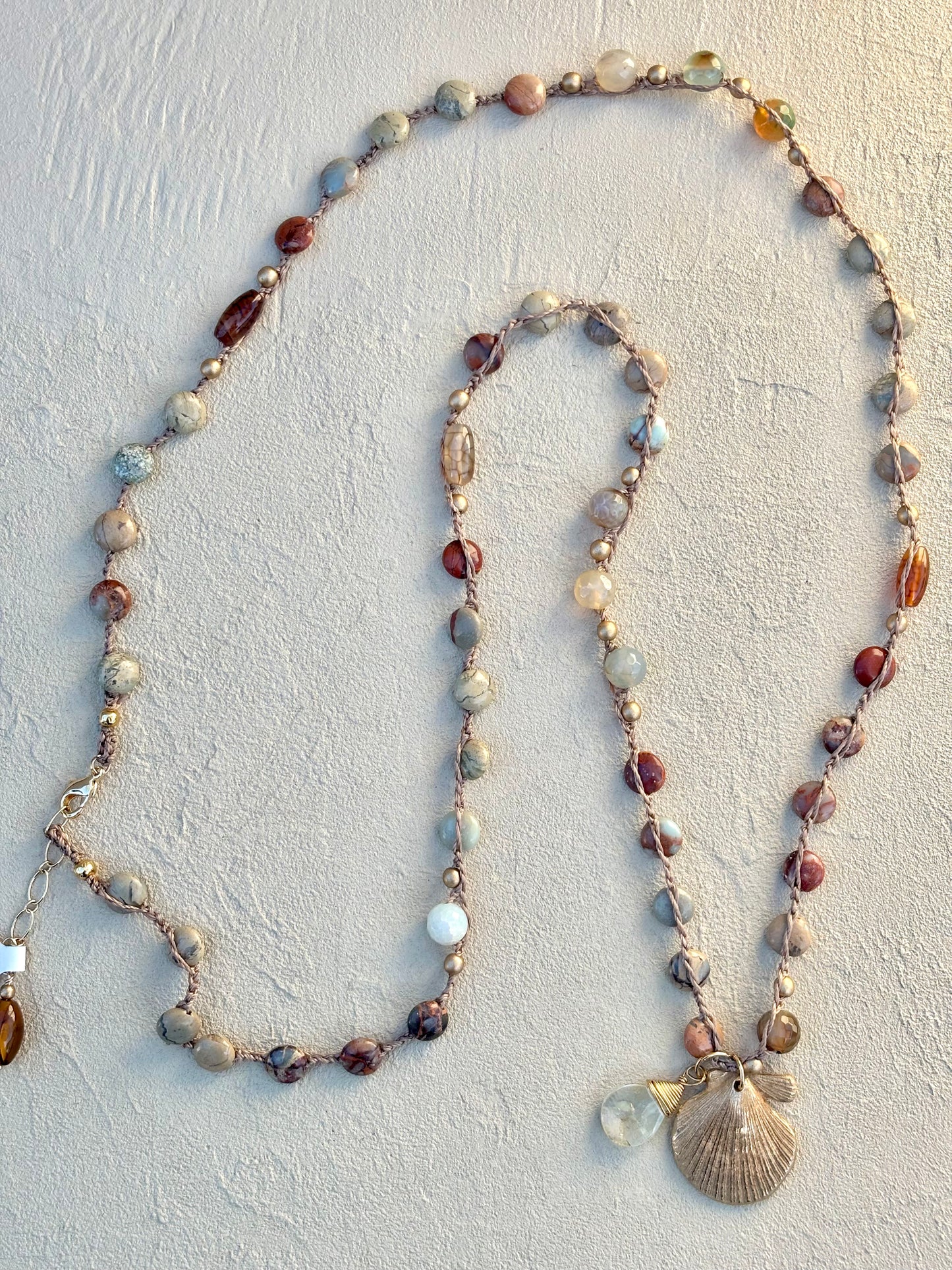 Bronze Pendants on Long Woven Semi-Precious Stone Necklaces (Assortment) Heidi Duran Inventory Fan Shell : Terra Jasper and Agate (34")