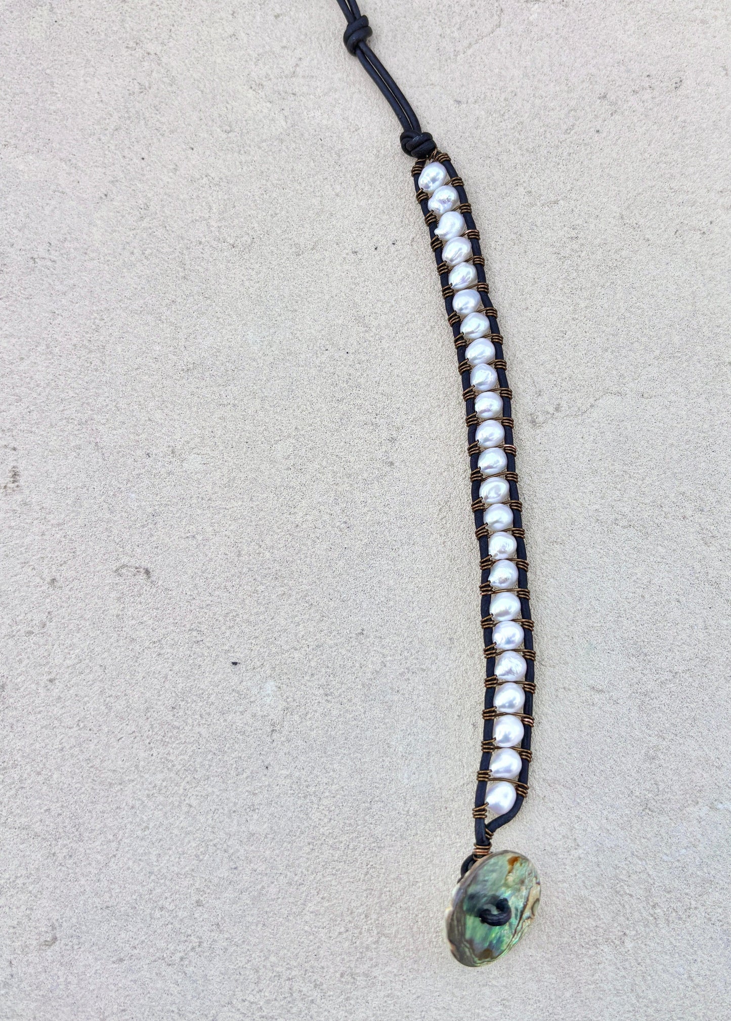"Pearl: Treasure of the Sea" Bracelets Heidi Duran Inventory White Pearls - Black Leather