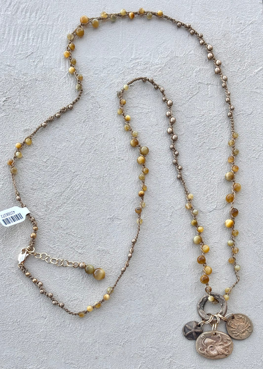 Bronze Pendants on Long Woven Semi-Precious Stone Necklaces (Assortment) Heidi Duran Inventory Octopus : Tigers Eye and gold beads (37")