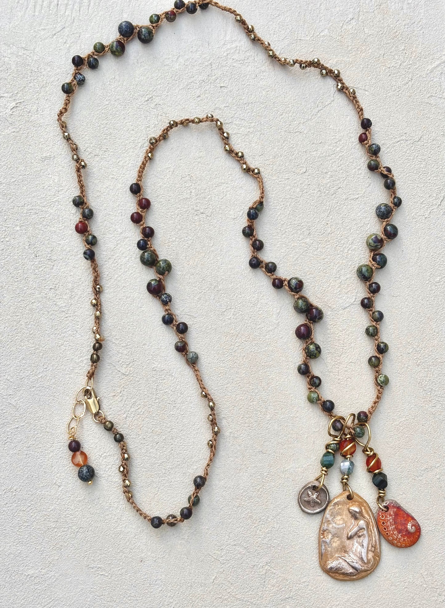 Bronze Pendants on Long Woven Semi-Precious Stone Necklaces (Assortment) Heidi Duran Inventory Seated Mermaid : Jasper Dragon Blood and Carnelian (37")