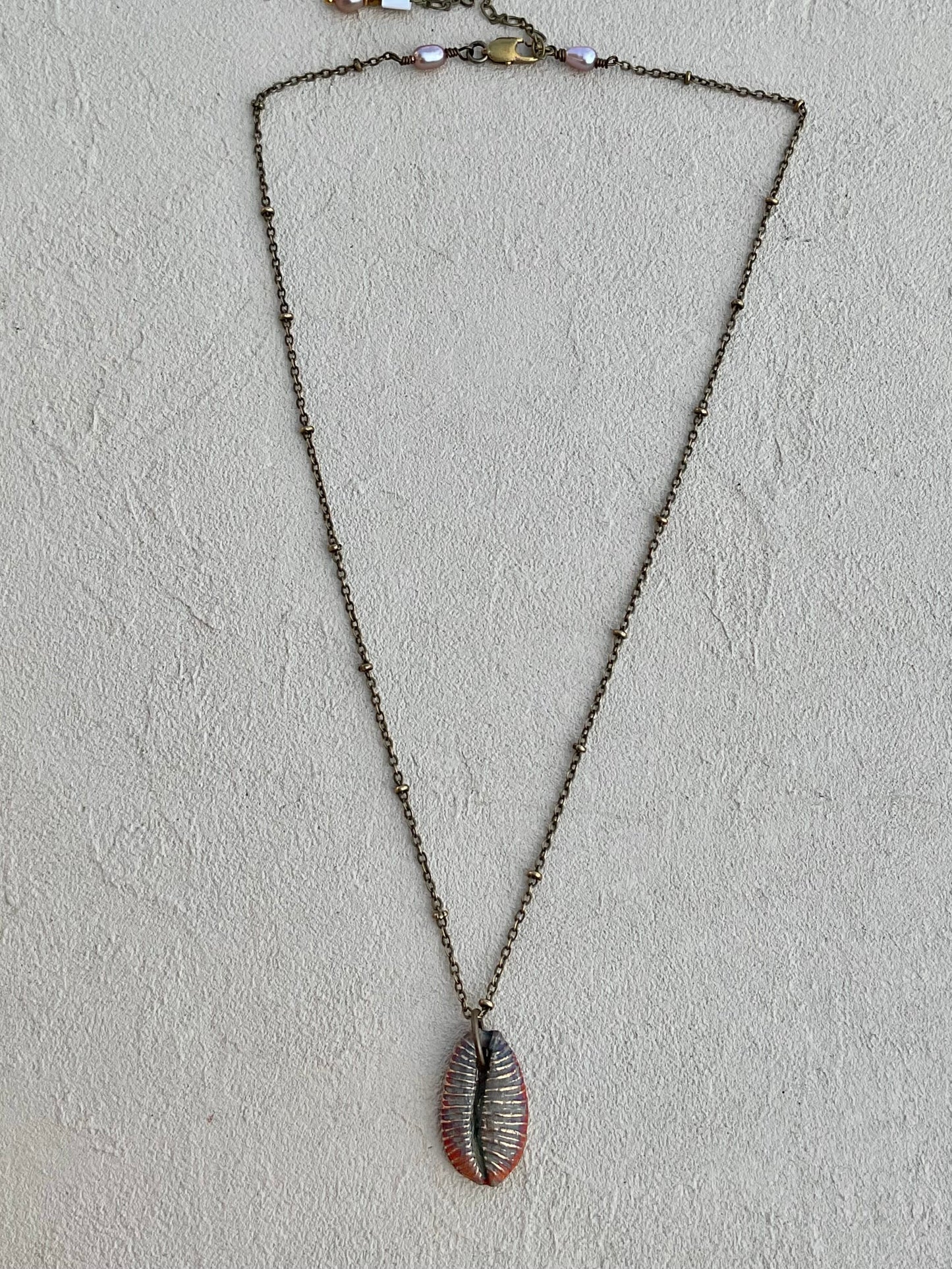 Bronze Sea-Inspired Pendants on Chain (Assortment) Heidi Duran Inventory Cowry Shell : 17" -18"