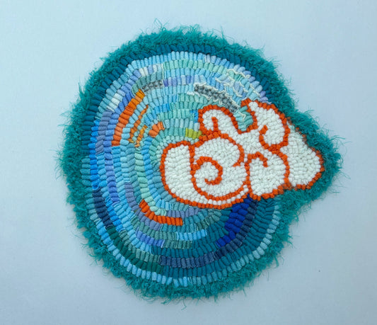 Hand Hooked "Clouds At Sea" Trivets S Newton Consignment Cloud with Orange Outline