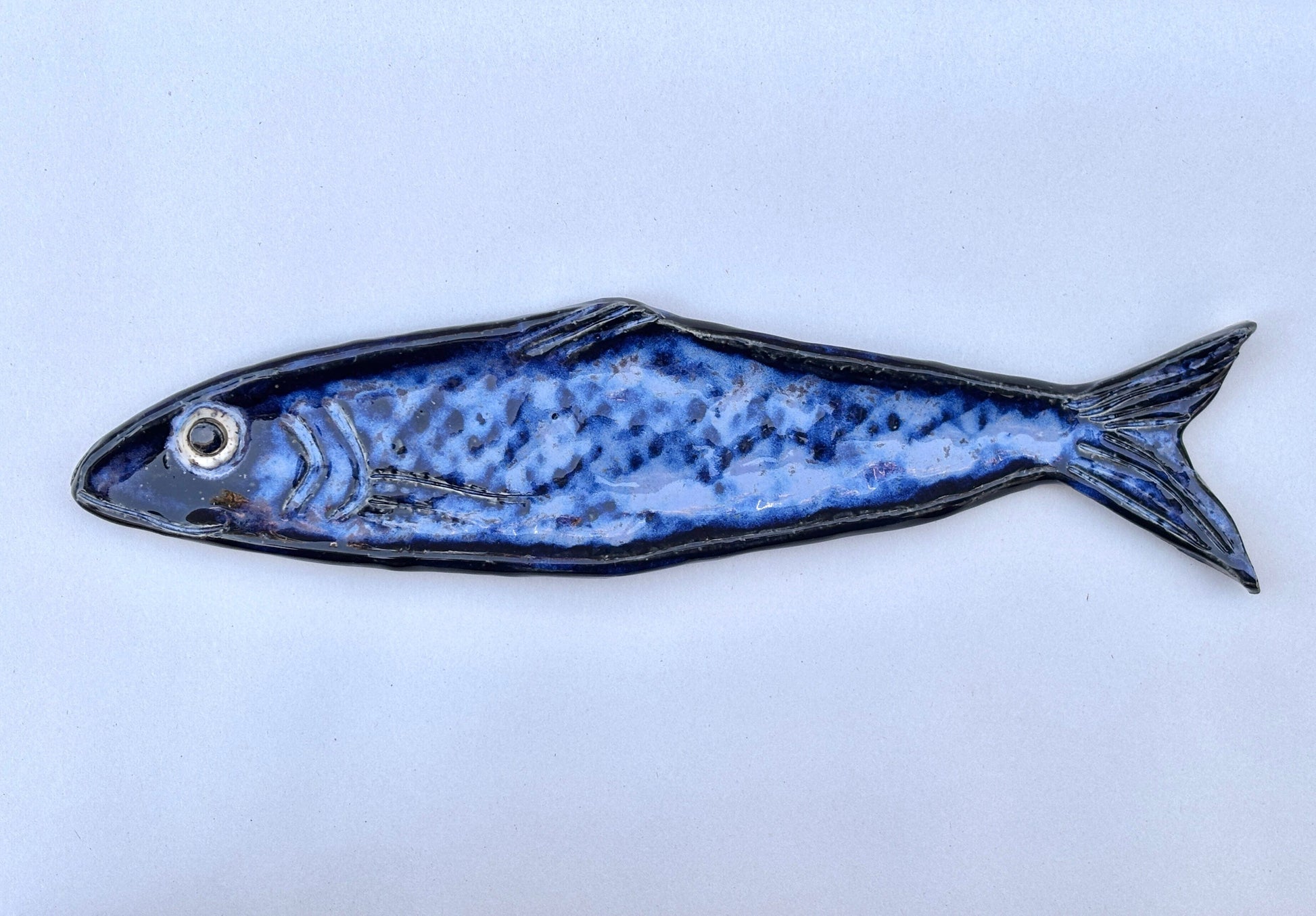 Large Ceramic Sardine Dishes Heidi Duran Consignment Midnight Blue - facing left