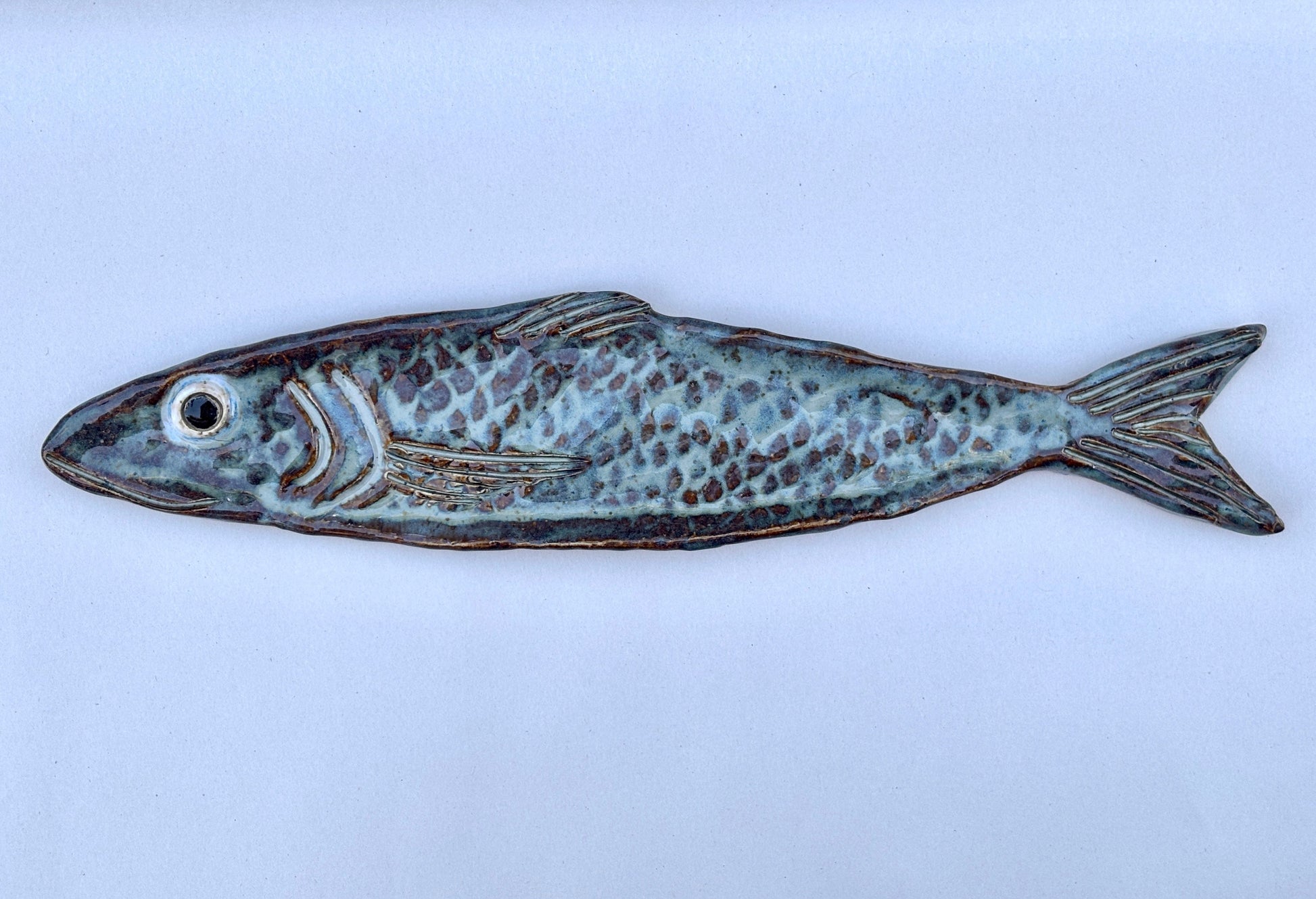Large Ceramic Sardine Dishes Heidi Duran Consignment Sky-Blue/Earth tone : facing left