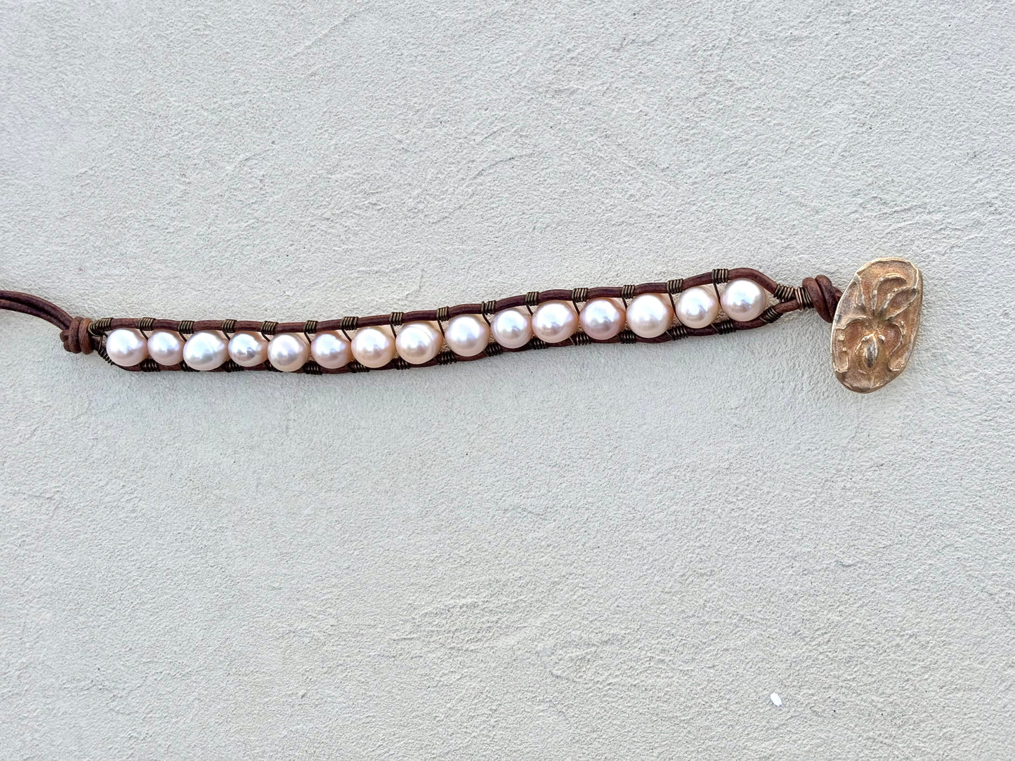 "Pearl: Treasure of the Sea" Leather Bracelets Heidi Duran Inventory Large Pale Pink Pearls w/ handmade Octopus bronze button